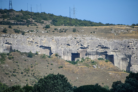 古老的岩石采石场 古代高度发达文明的证据 克里米亚半岛挖掘地标旅行石灰石蓝天石窟矿物工程洞穴景点图片