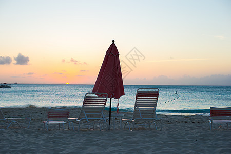 热带异端海滩天堂观景情调椅子休息室海岸沿海海景异国蓝色晴天天空图片