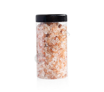 塑料瓶装的喜马拉雅粉色盐 在白色复古中被禁岩石调味品玫瑰香料水晶香气石英美食治疗矿物图片