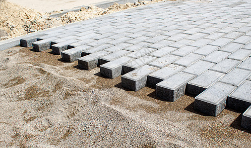 建造用瓷砖制成的新的现代人行道砌块城市平板技术材料建筑学工作碎石路面铺路图片