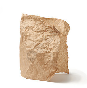 折叠的棕色皱巴巴的羊皮纸 白色隔离耳朵蜡质食物烹饪床单面包烘烤包装褐色边缘图片