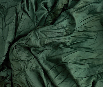缝制窗帘用绿色缎面纺织面料波纹曲线折叠奶油海浪帆布材料丝绸布料纺织品图片