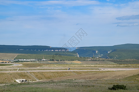 克里米亚自然景观 路边汽车窗外可见田地和山丘地区旅游国家草地爬坡风景环境向日葵旅行荒野图片