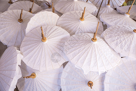 彩色纸伞是手工制作的工艺旅行橙子文化纪念品阳伞活力展示市场收藏图片