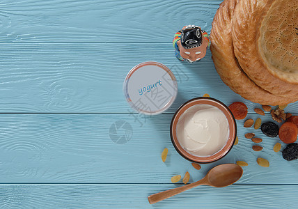 蓝底奶制品产品蓝底乡村乳清奶油营养早餐杯子蓝色甜点塑料纪念品图片