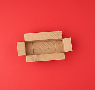 用于运输和快捷键的空平面棕色纸板盒仓库牛皮纸船运纸盒回收盒子材料货运纸板邮政背景图片