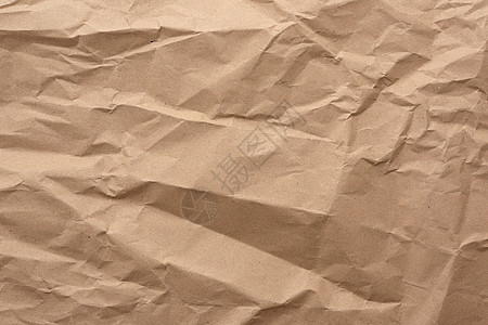 棕色包装牛皮纸皱巴巴的空白纸片的碎片折痕手稿纸板纸盒床单包装纸纤维皱纹回收羊皮纸图片