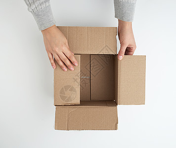 用于运输和快捷键的空平面棕色纸板盒回收店铺盒子纸盒工艺牛皮纸材料包装送货正方形背景图片