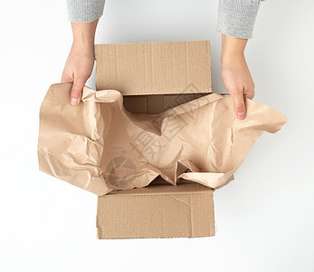 用于运输和快捷键的空平面棕色纸板盒店铺应付正方形商业纸盒船运邮件回收货物牛皮纸图片