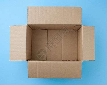用于运输和快捷键的空平面棕色纸板盒材料船运盒子货运贮存纸盒工艺回收货物送货图片