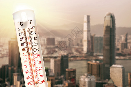 热浪期间的温度计天空摩天大楼环境加热橙子气候天气建筑物气象太阳图片