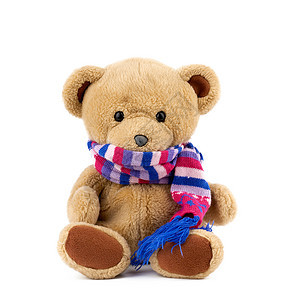 棕褐色可爱泰迪熊 穿着彩色织毛围巾坐在一旁孩子孤独动物玩具展示工作室毛皮喜悦童年孩子们背景图片