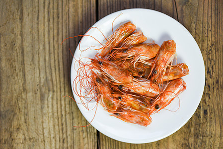 深油炸虾头 美味的调味香料食物小吃烹饪动物盘子香菜美食午餐草药贝类图片