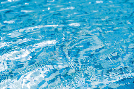 游泳池纹理背景中的水游泳液体海浪假期蓝色季节透明度阳光白色反射图片