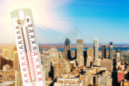 热浪期间的温度计景观气候摩天大楼海浪环境橙子温度市中心晴天太阳图片