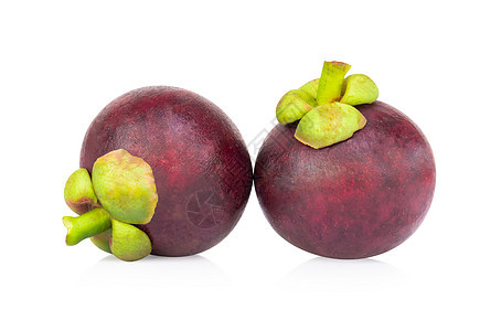 在白色背景上隔离的新鲜芒果水果食物紫色植物叶子饮食剪裁蓝色营养健康果汁图片