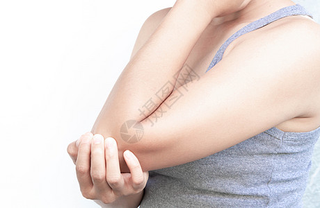 紧紧的女士手握肘部 白色背景上疼痛手臂治疗药品关心肌肉身体女性按摩伤害压力图片
