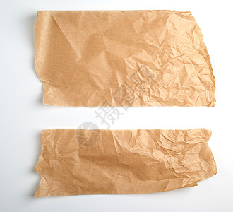 白色背景上撕破的棕色羊皮纸材料牛皮纸边缘笔记回收黄色空白床单纸板框架图片