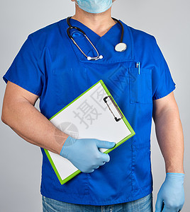 蓝制服医生和无菌乳胶手套贴有剪贴板专家情况手术身体外科职业医院蓝色诊所医师图片