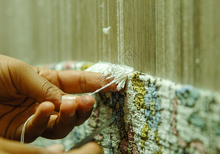 编织地毯和织织织手指手工业村庄丝绸手工棉布羊毛小地毯工作女性图片