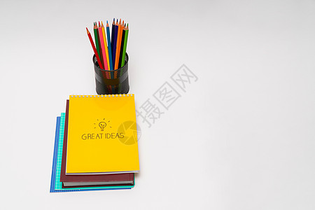 笔纸和彩色铅笔笔记篮子文档绘画商业床单笔记本学校知识学习图片