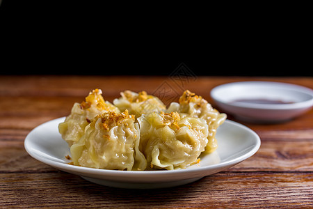 中国蒸汽垃圾 沙门 白菜上满是大豆酱用餐烹饪酱油文化团体小吃点心美食饺子猪肉图片