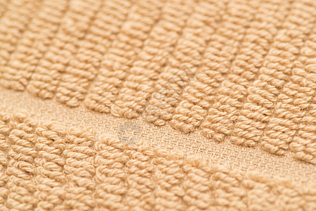 织物和纺织品的背景帆布棉布材料洗澡浴室棕色墙纸宏观纤维毛巾图片