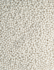 塑料颗粒背景粮食颗粒剂颗粒状珠子材料化学品白色乙烯粒子聚合物图片