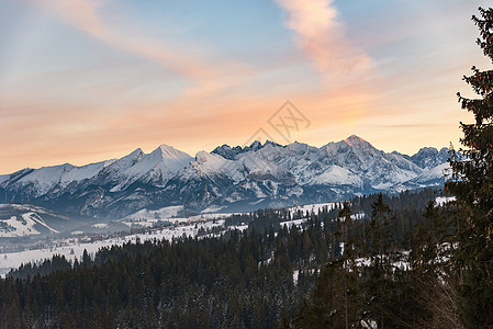 塔特拉高山冬季地貌滑雪蓝色日落场景橙子旅游山脉季节薄雾旅行图片