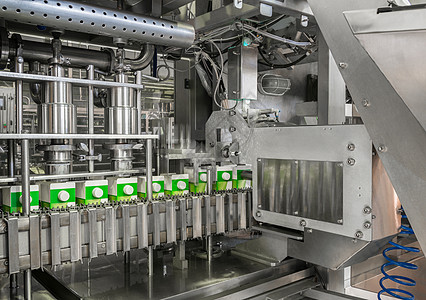 牛奶厂的设备腰带自动化机器机械饮料商业纸盒运动盒子作坊图片