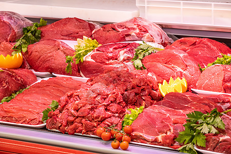 商场里肉店的肉品部营养摊位产品展示购物中心冰箱店铺橙子烹饪市场图片