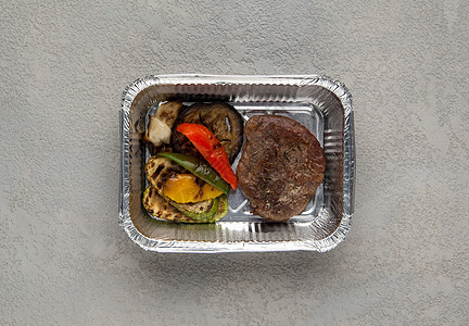 盒中快餐养护晚餐蔬菜送货灰色营养产品盒子炙烤金属背景图片