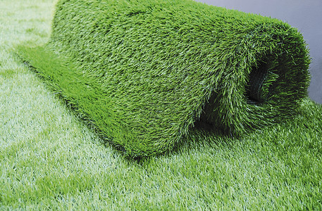 花园里的人造草地板环境植物绿色土地园艺绿色植物高尔夫球草皮地面背景图片