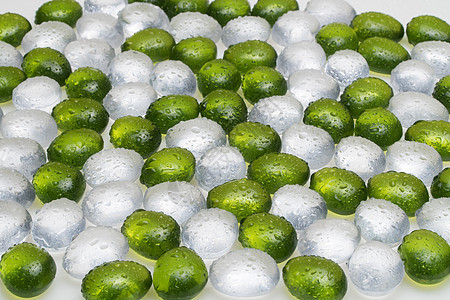 圆形塑料鹅卵石石头背景碎石玻璃材料团体白色模仿岩石绿色图片