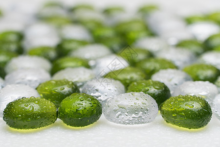 圆形塑料鹅卵石模仿团体背景材料白色石头绿色岩石玻璃碎石图片