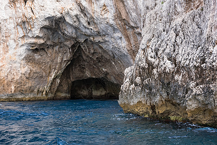 卡普里岛岩石海岸的海洞穴海岸线旅游悬崖天堂地平线意大利语洞穴海景海洋石窟图片