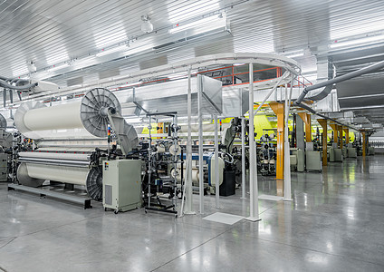 工厂的编织车间筒管纤维织物生产别针机械材料技术机器纺织品图片