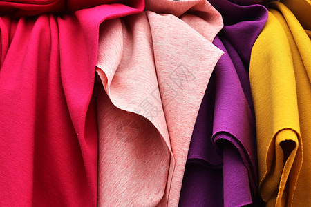 不同布料和织物样品的详细特写视图丝绸桌布奢华市场布样纺织品材料样本衬衫折痕图片