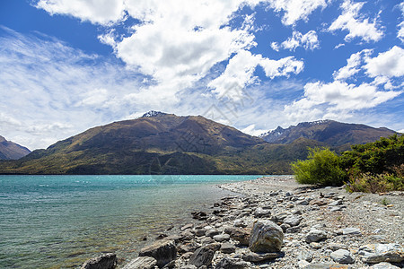 Wanaka湖新西兰南部岛屿蓝色海岸顶峰爬坡草地晴天天线天空旅游旅行图片