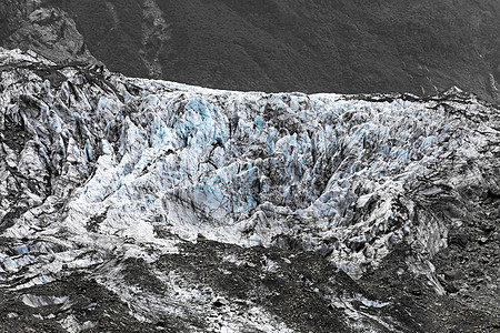 新西兰山脉岩石薄雾风景天气灰色石头旅行旅游冰川图片