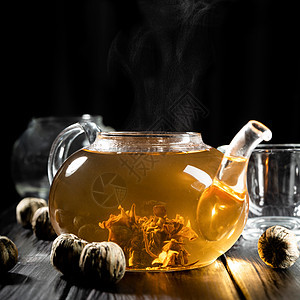 热水倒进玻璃茶壶 加上中国茶植物文化桌子蒸汽液体饮料乡村草本植物香气早餐图片