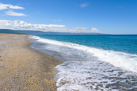 喀拉布里亚海岸的景象岩石悬崖石头反射蓝色海景地平线波浪热带旅行图片