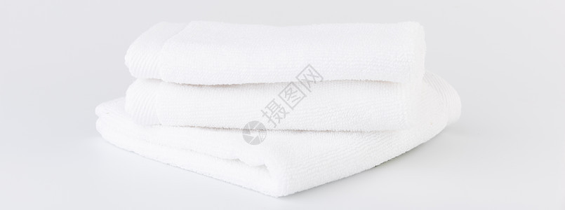 白色背景的白毛巾堆叠洗澡材料横幅纺织品家庭卫生桑拿折叠团体洗衣店图片
