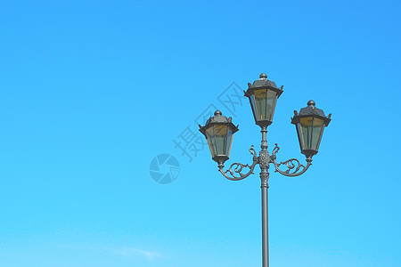街道双灯辉光玻璃黑色天空灯柱路灯灯笼灯泡蓝色金属图片