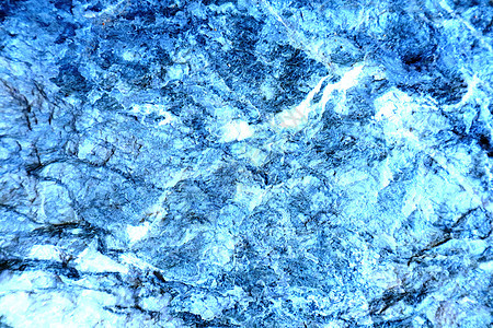 古代冰霜颜色花岗岩石表面的洞穴矿物火山花纹侵蚀地面墙纸岩石床单花岗岩橙子背景图片