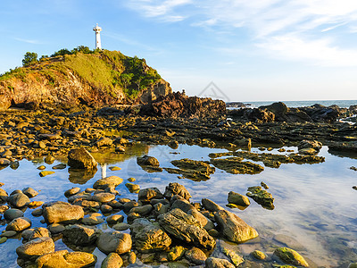 与泰国高兰坦岛旧灯塔的海景天空地质学石头热带假期海滩旅行支撑悬崖海洋图片