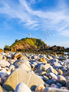 与泰国高兰坦岛旧灯塔的海景风景旅游假期海洋地面海岸线天空热带岩石爬坡图片