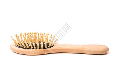 白色背景上的木梳子卫生刷子理发师发型塑料女性工具沙龙造型头发图片