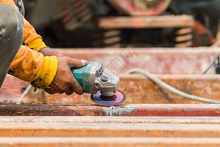 钢铁工人焊接 研磨 切割金属工业工匠磨床工厂焊机工具闪光制造力量维修劳动图片