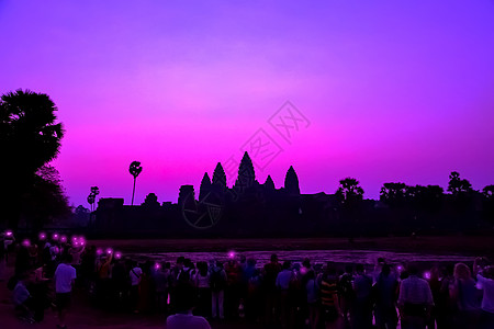 朝廷的吴哥寺庙圣址相机摄影紫色照片远足者收获旅游游客建筑学假期图片